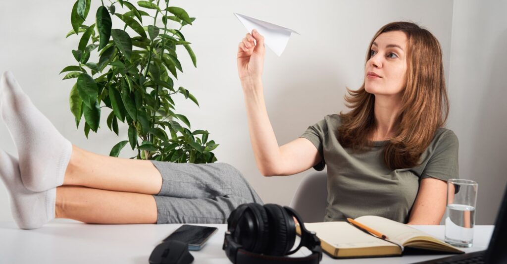 Freelancer procrastinating with low motivation and focus